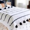 Moroccan tassel blanket with black poms