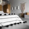 Moroccan tassel blanket with black poms