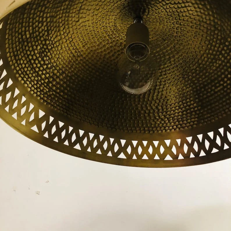 Elegant brass pendant light adding a touch of luxury to modern interiors. brass pendant light