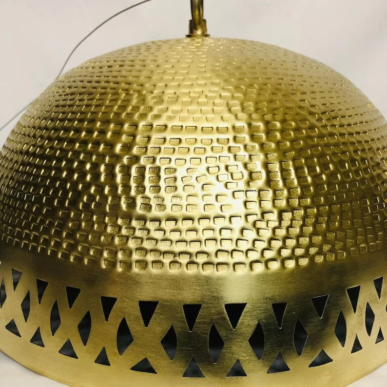 Elegant brass pendant light adding a touch of luxury to modern interiors. brass pendant light