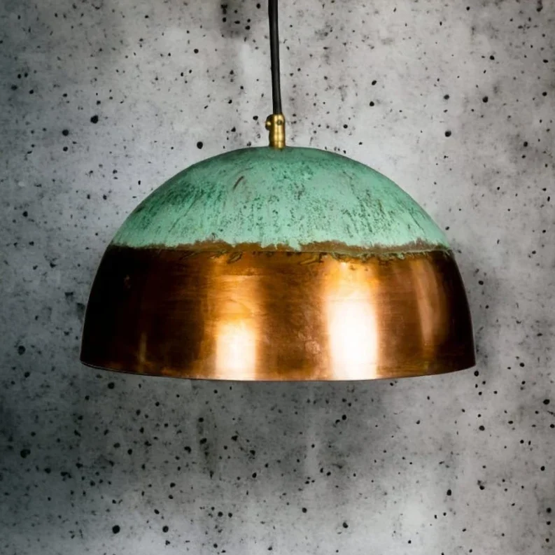 Copper pendant light featuring a handcrafted design, rich finish, and adjustable chain for versatile use. copper pendant light